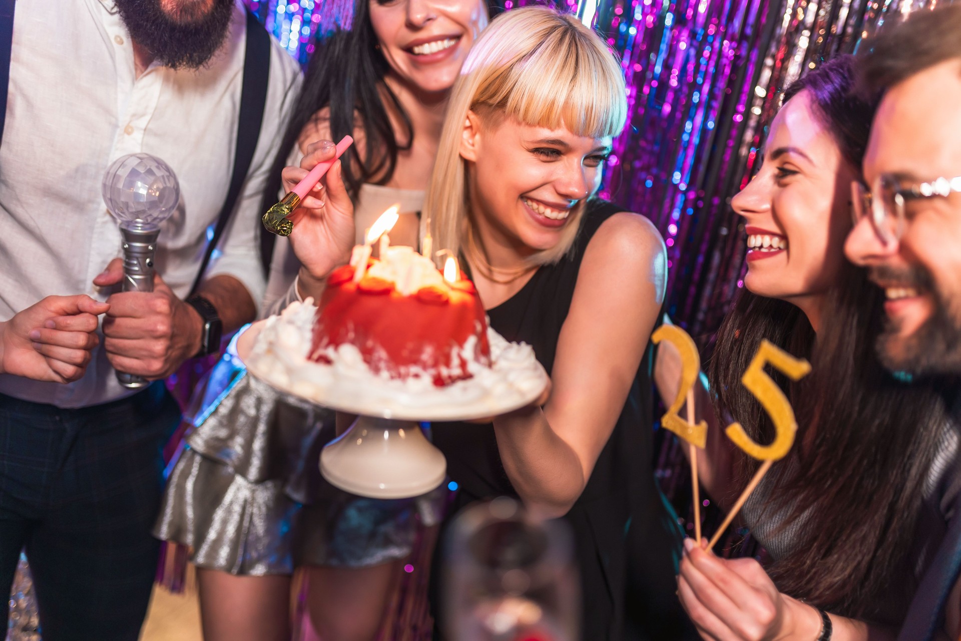 Friends birthday party in night club.